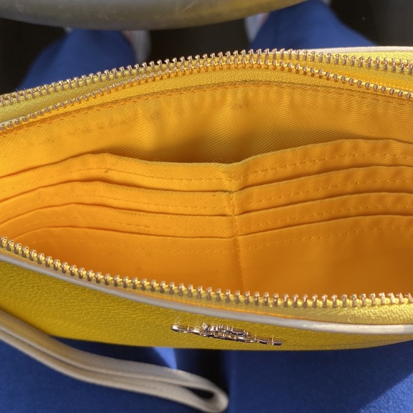 Yellow wristlet wallet, coach and leather, a good amount of space in the pockets - Picture 5 of 5
